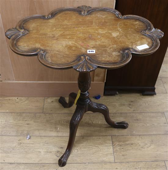 An oval topped mahogany wine table, W.74cm